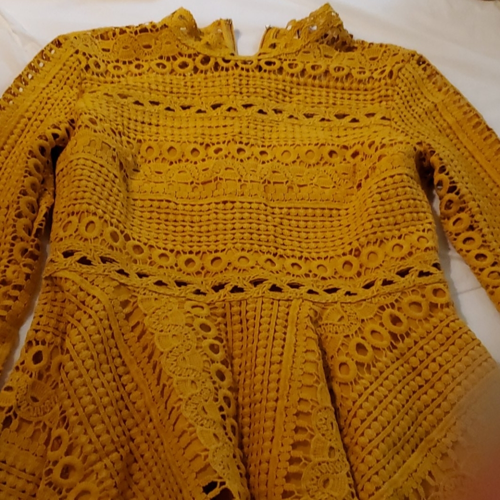 Beautiful gold peplum top